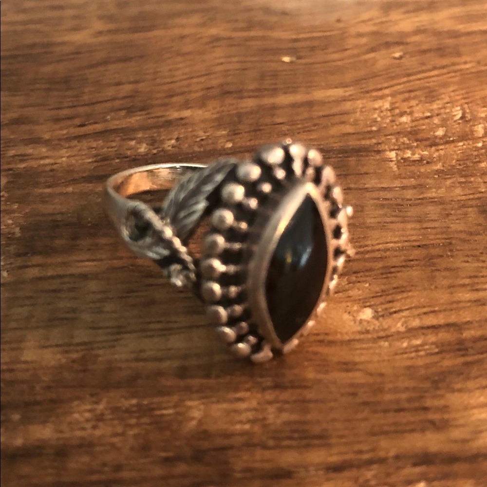 Four sterling silver rings Sold separately